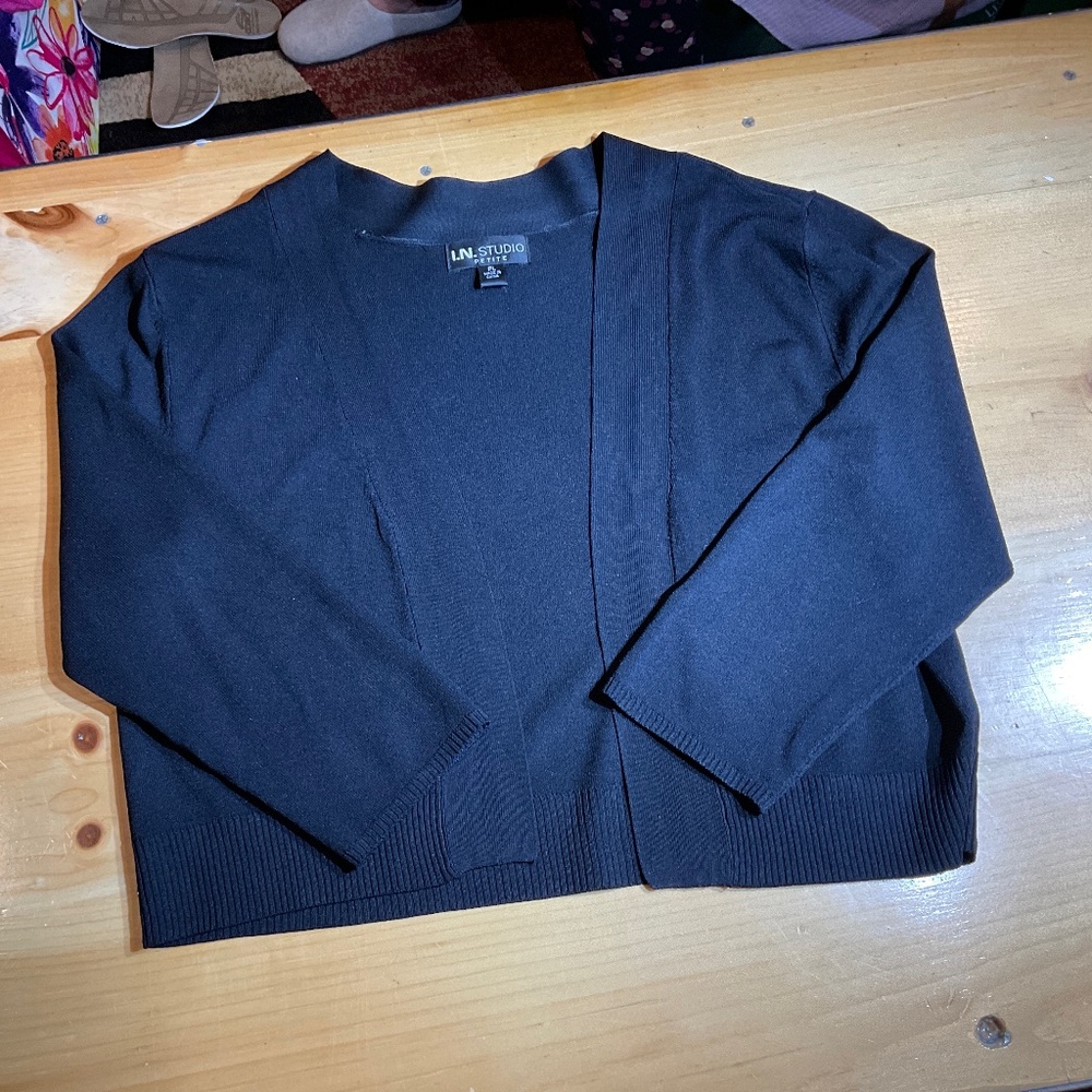 Black shrug, crop length, with 3/4 length sleeve, great for over dresses , PL